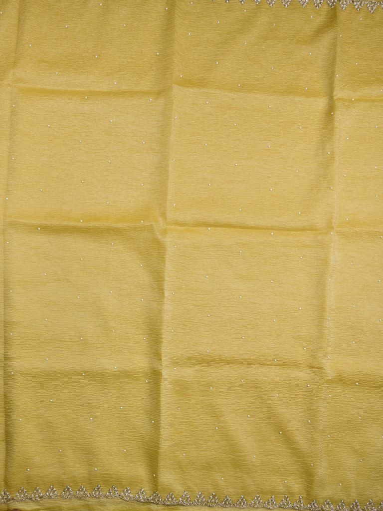 Chiffon crush fancy saree light yellow color allover stone work & embroidery border with running pallu and attached self blouse