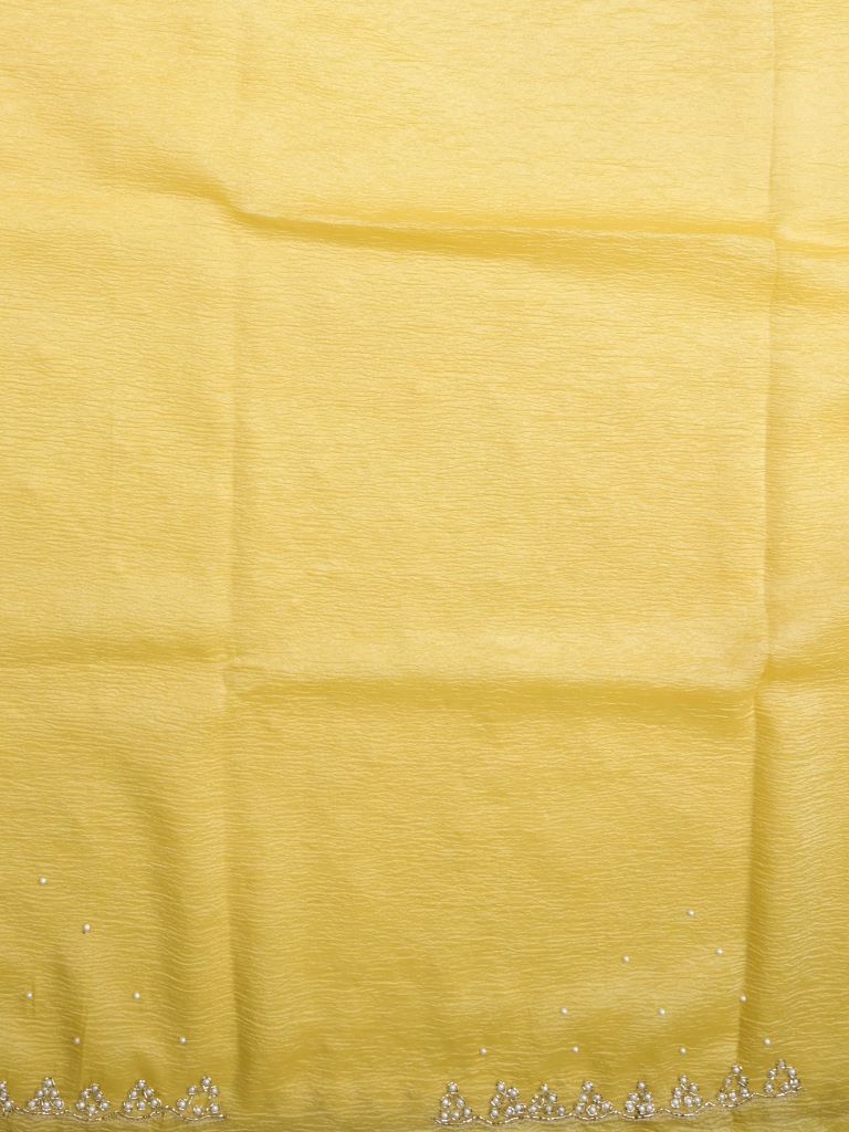 Chiffon crush fancy saree light yellow color allover stone work & embroidery border with running pallu and attached self blouse
