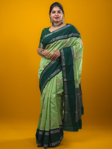 Banaras fancy saree pista green color allover zari motifs & kaddi border with contrast brocade pallu and brocade blouse