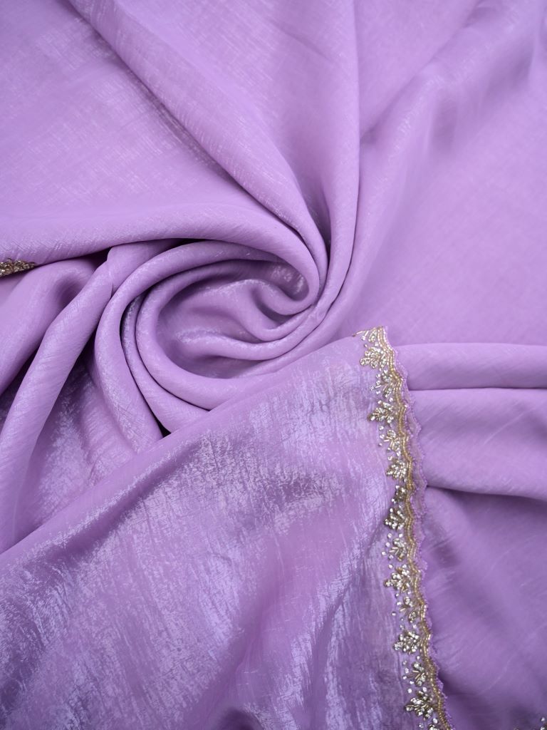 Organza shimmer lavender color allover embroidery butis & embroidery border with running pallu and attached blouse