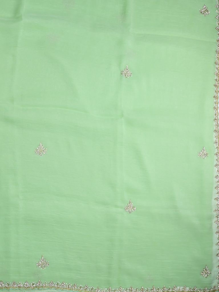 Organza shimmer pista green color allover embroidery butis & embroidery border with running pallu and attached blouse