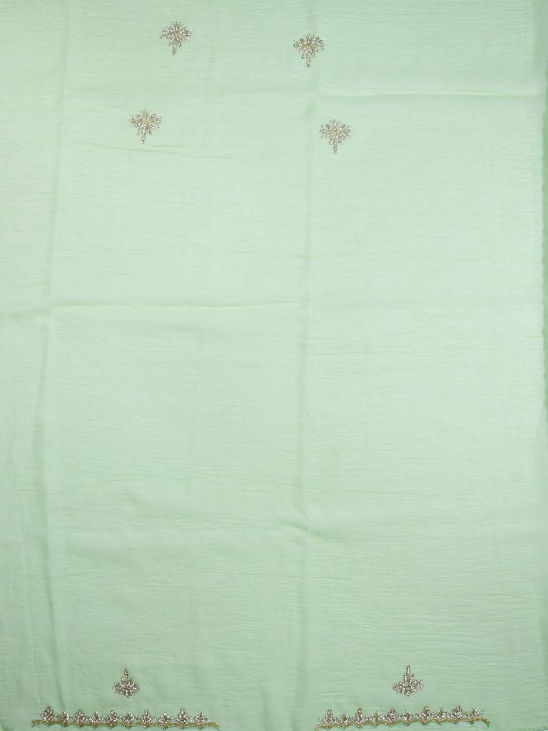 Organza shimmer pista green color allover embroidery butis & embroidery border with running pallu and attached blouse