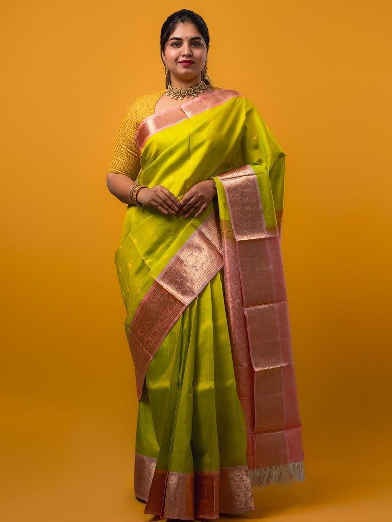 Pethambari pattu saree green color allover zari motifs & kanchi border with rich pallu and attached plain blouse