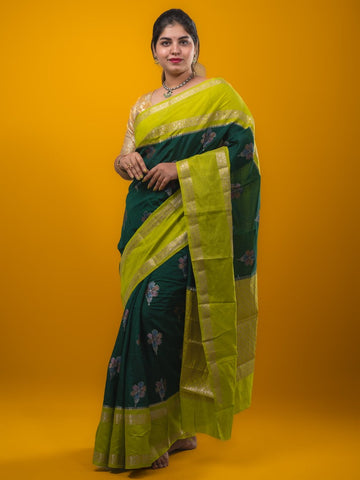 Banaras fancy saree bottle green color allover zari motifs & kaddi border with contrast brocade pallu and brocade blouse