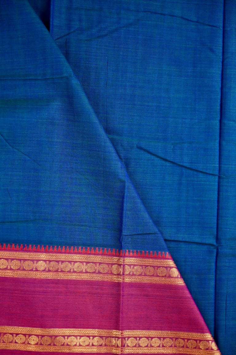 Narayanpet cotton saree peacock green with contrast zari gap border, short pallu and plain blouse.