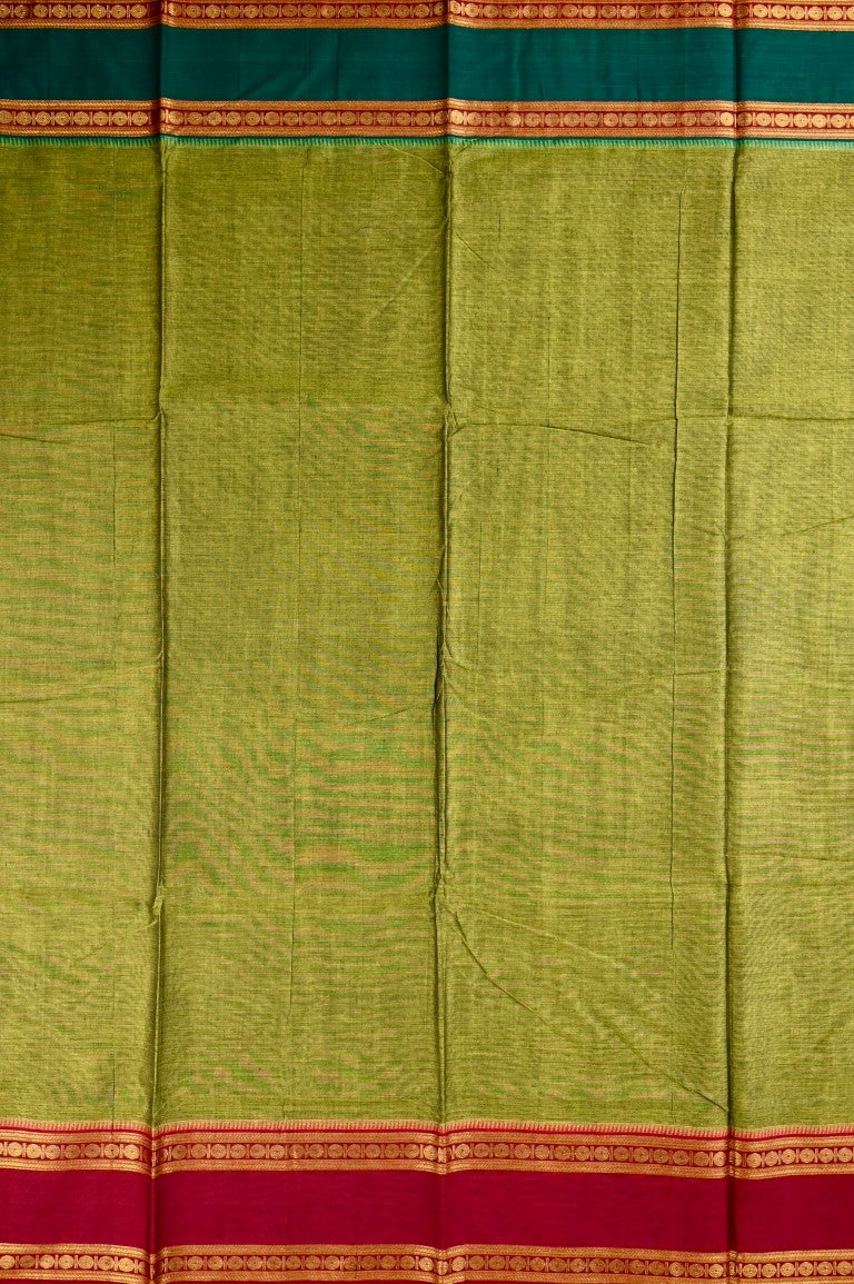 Narayanpet cotton saree green color with contrast zari gap border, short pallu and plain blouse.
