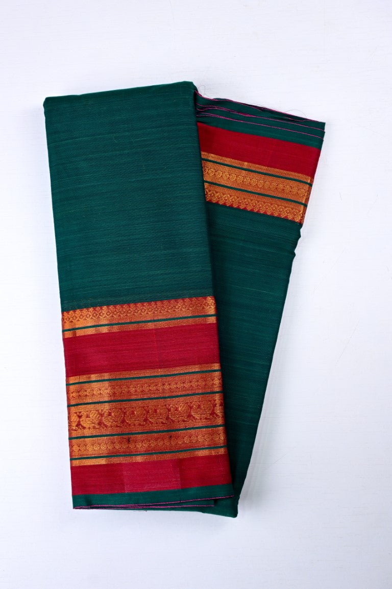 Narayanpet cotton saree bottle green color with contrast big zari border, short pallu and plain blouse.