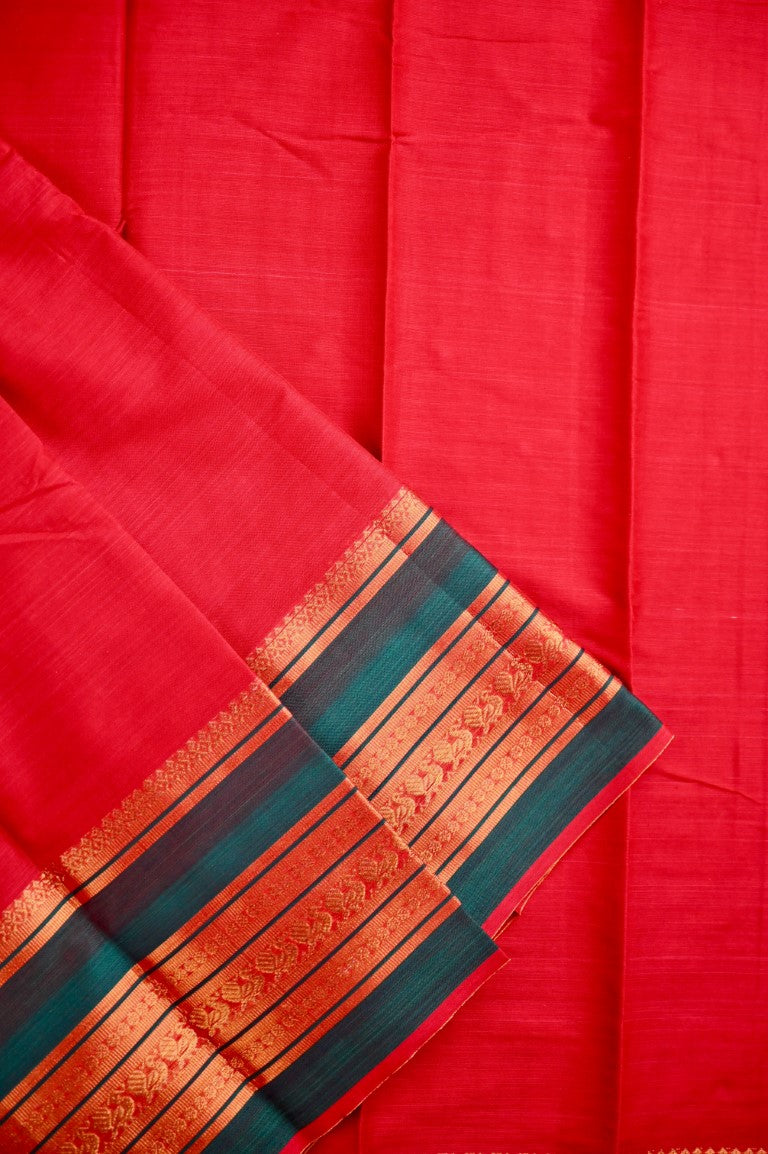 Narayanpet cotton saree red color with contrast big zari border, short pallu and plain blouse.