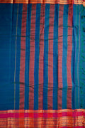 Narayanpet cotton saree peacock green color with contrast big zari border, short pallu and plain blouse.