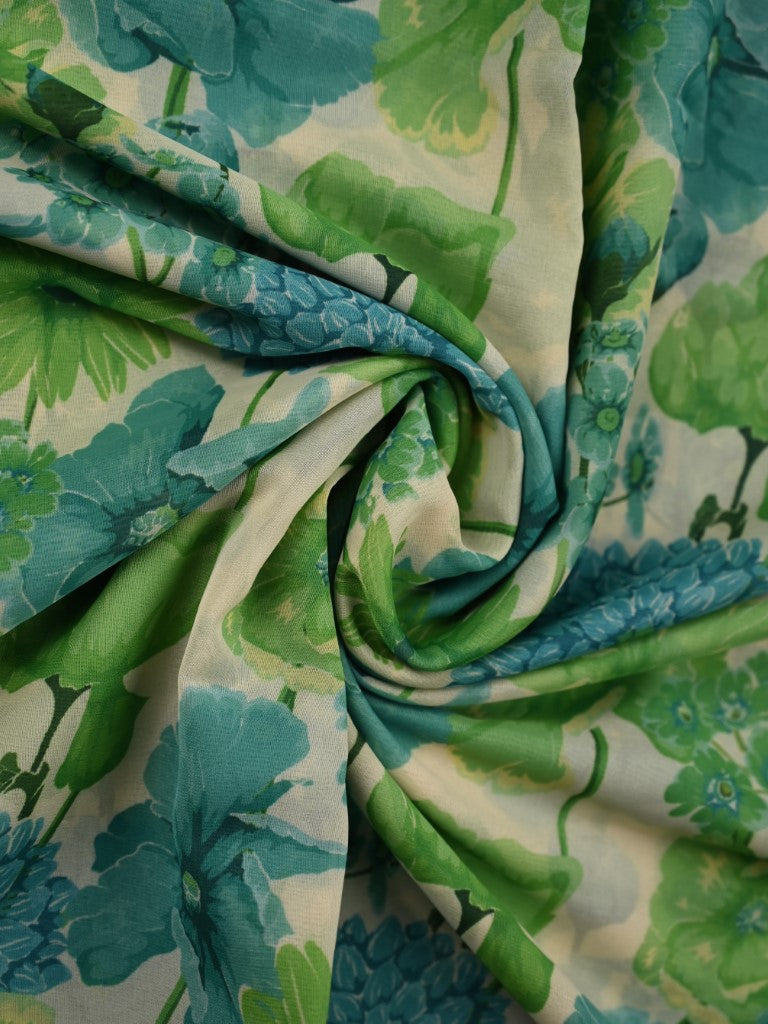Organza saree cream and dark green color with allover floral digital prints, small zari border, short pallu and printed blouse