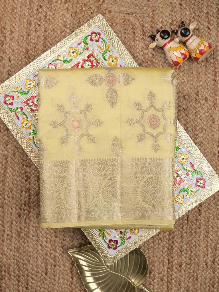 Raw mango pattu saree light yellow color allover zari weaves & zari border with rich pallu and attached plain blouse