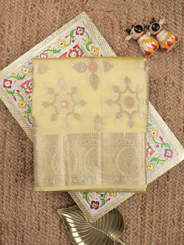 Raw mango pattu saree light yellow color allover zari weaves & zari border with rich pallu and attached plain blouse