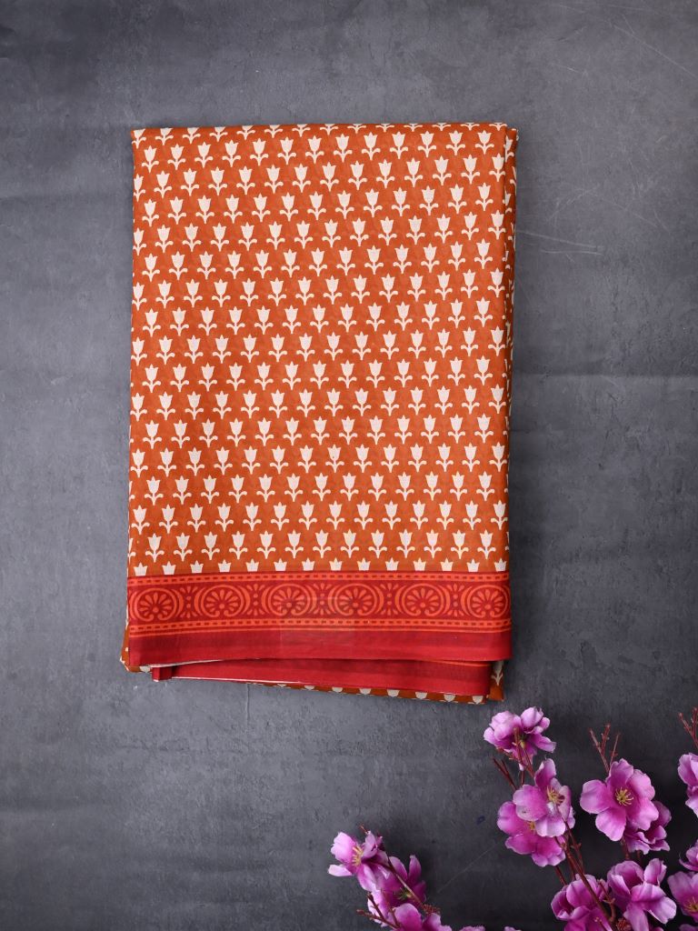 Cotton printed saree orange color allover prints & small border with printed pallu and contrast plain blouse