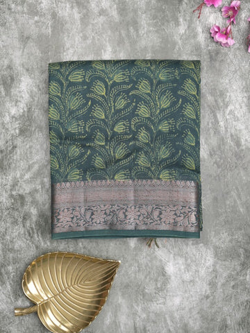 Maheshwari fancy saree dark green color allover prints & zari border with rich pallu and attached printed blouse