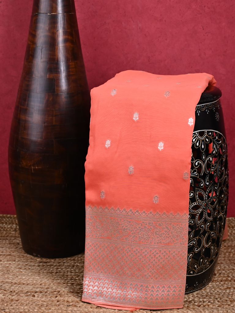 Georgette fancy saree light orange color allover zari motifs & big zari border with rich pallu and attached plain blouse