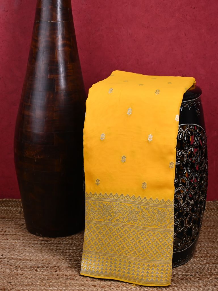 Georgette fancy saree lemon yellow color allover zari motifs & big zari border with rich pallu and attached plain blouse