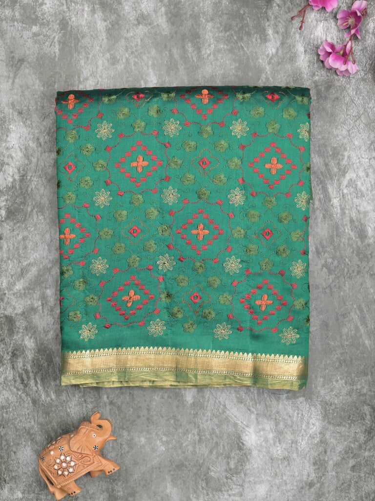 Munga pattu saree bottle green color allover weaves & small zari border with short pallu and attached plain blouse
