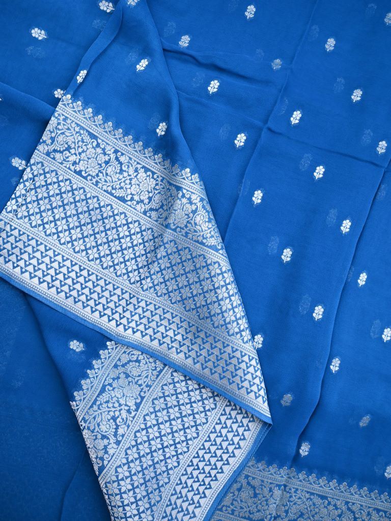 Georgette fancy saree sky blue color allover zari motifs & big zari border with rich pallu and attached plain blouse