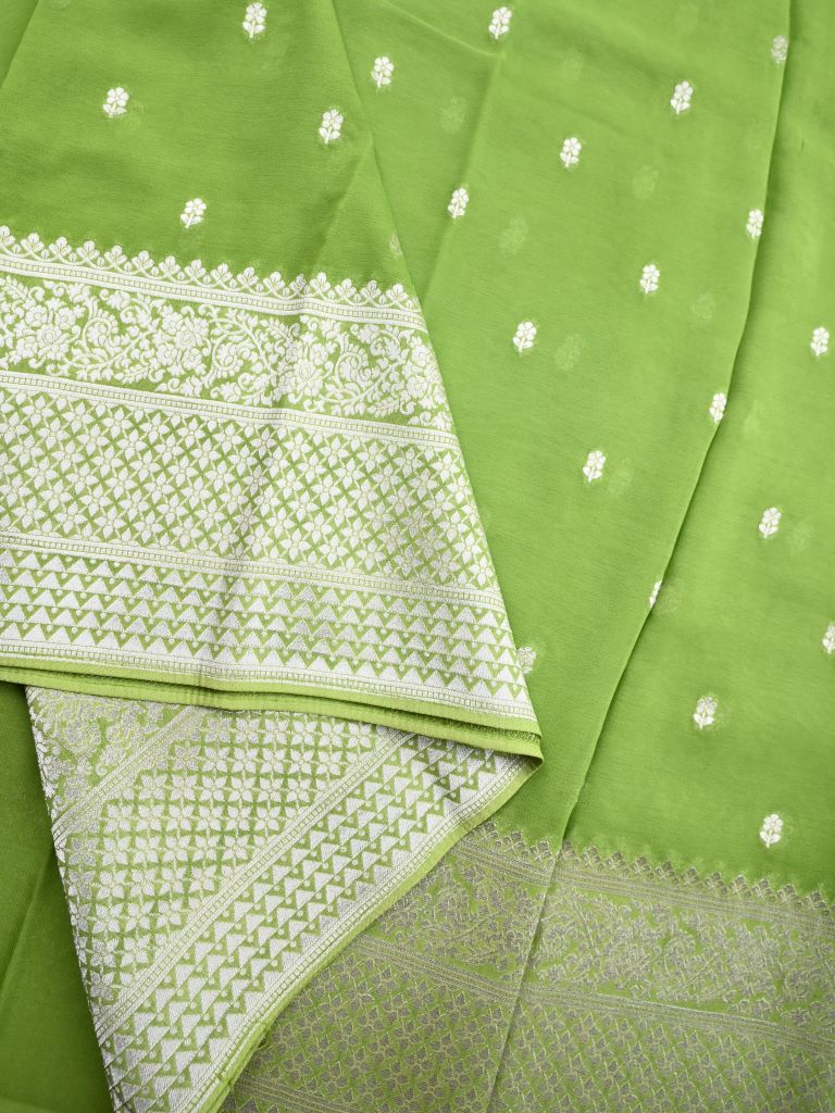 Georgette fancy saree parrot green color allover zari motifs & big zari border with rich pallu and attached plain blouse