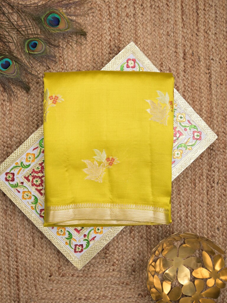 Raw mango pattu saree lemon yellow color allover zari weaves & small zari border with short pallu and contrast blouse