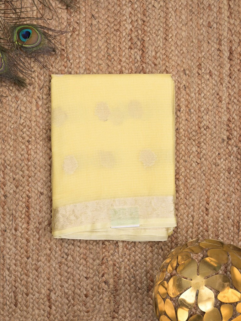 Pure silk kota fancy saree light yellow color allover zari motifs & zari border with short zari pallu and attached plain blouse