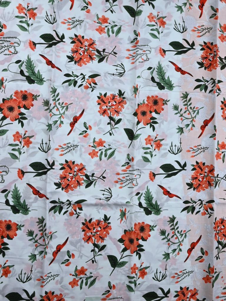 Cotton printed saree white color allover prints & printed border with printed pallu and contrast printed blouse