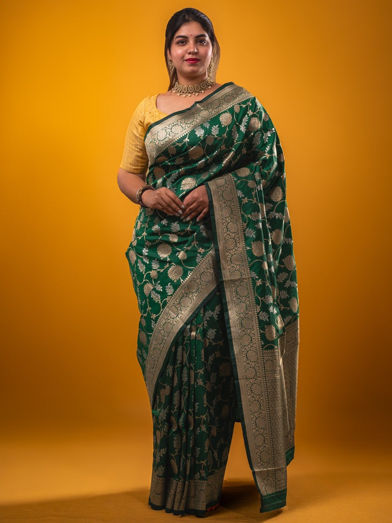 Banaras fancy saree bottle green color allover zari weaves & zari border with rich pallu and plain blouse