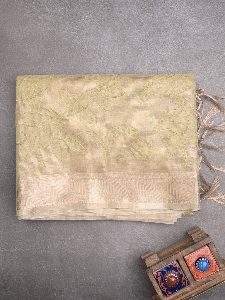 Kota tissue fancy sraee cream color allover embroidery & zari border with short pallu and attached self blouse