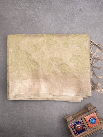 Kota tissue fancy sraee cream color allover embroidery & zari border with short pallu and attached self blouse