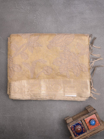 Kota tissue fancy sraee beige color allover embroidery & zari border with short pallu and attached self blouse