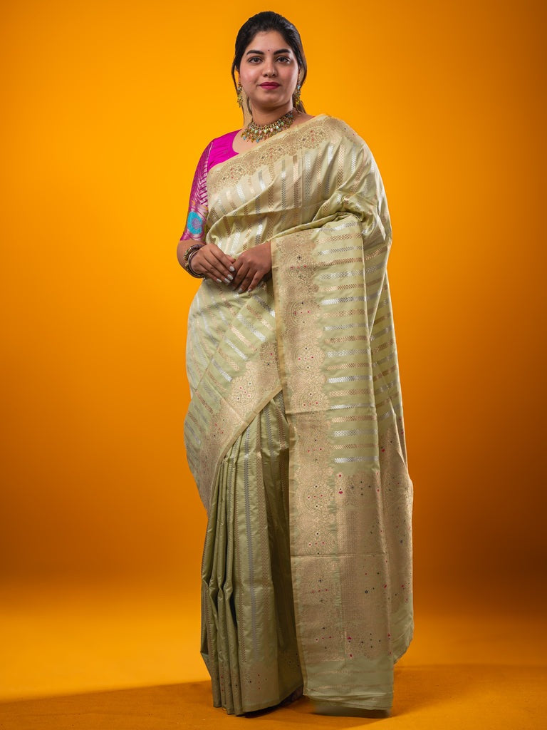 Banaras fancy saree light pista green color allover zari weaves & zari border with rich pallu and plain blouse