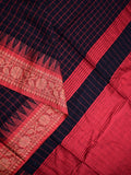 Jute kadhi cotton black color allover checks & contrast border with contrast pallu and running blouse