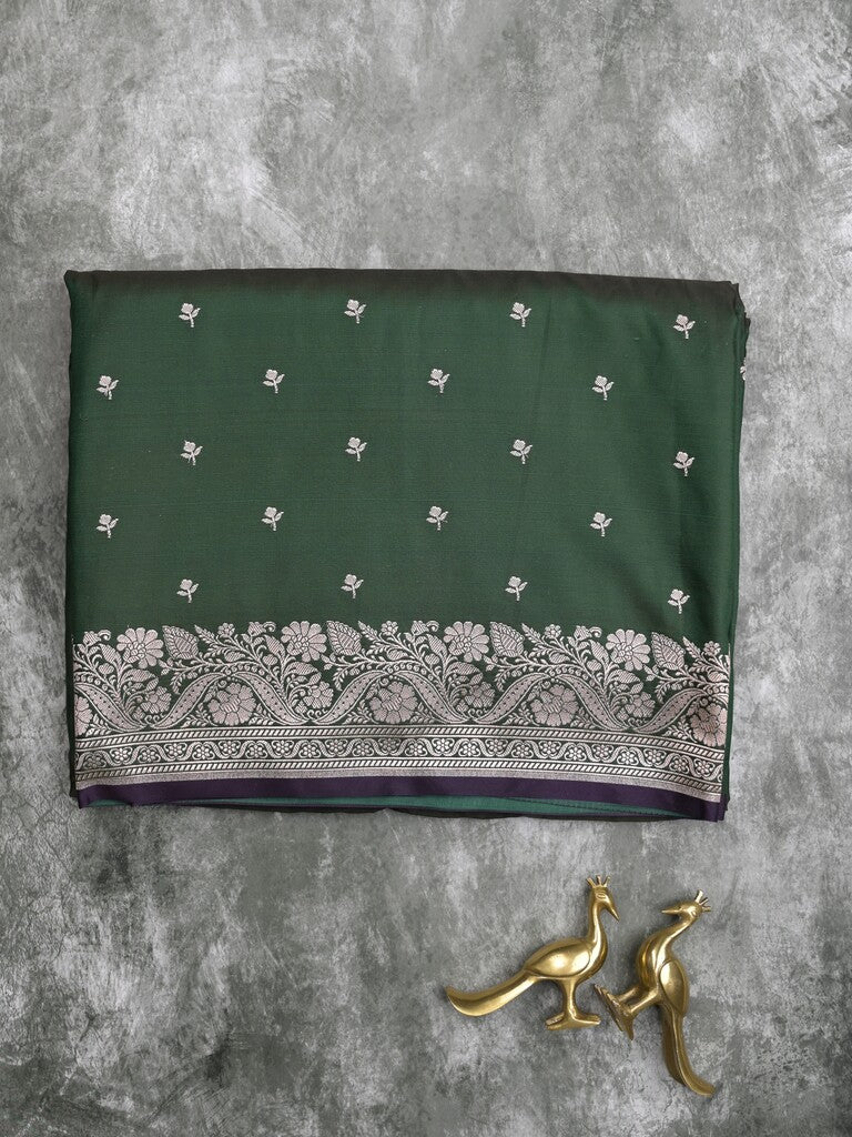 Satin silk fancy saree dark green color allover motifs & zari border with rich pallu and attached blouse