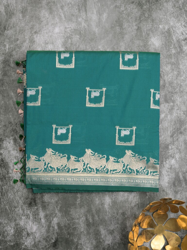 Raw mango fancy saree peacock blue color allover zari weaves & zari border with zari border and attached blouse