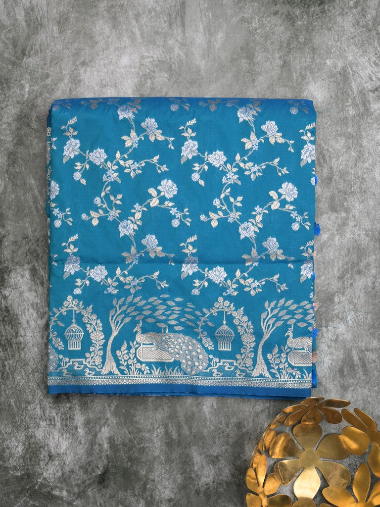 Raw mango fancy saree sky blue color allover zari weaves & zari border with zari border and attached plain blouse