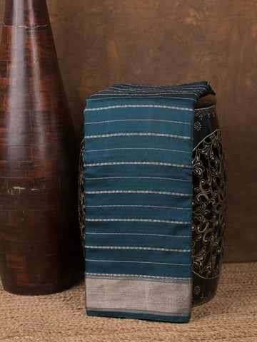 Dola silk fancy saree peacock blue color allover zari weaves & small kaddi border with short pallu and running blouse