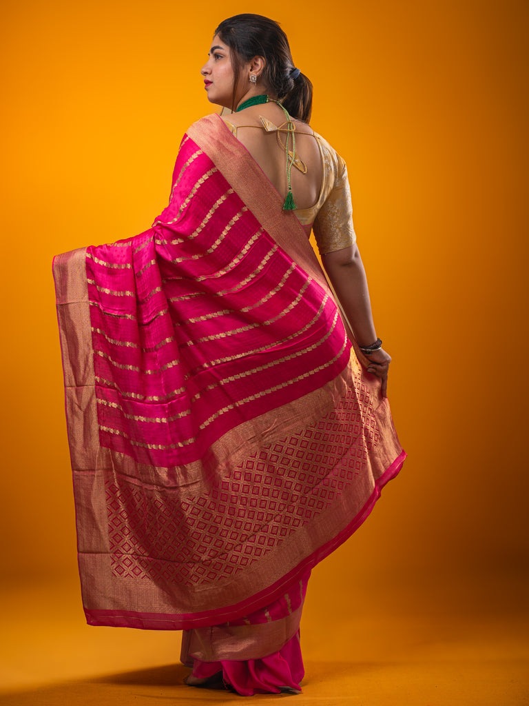 Crape fancy saree rose pink color allover zari weaves & zari border with zari pallu and plain blouse