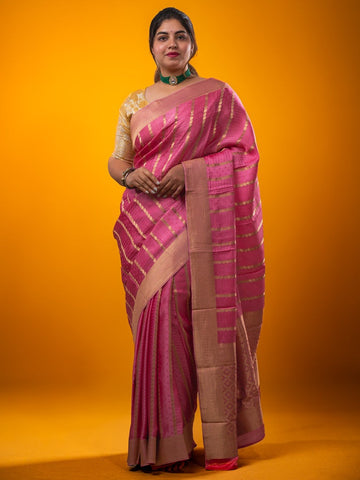 Crape fancy saree baby pink color allover zari weaves & zari border with zari pallu and plain blouse
