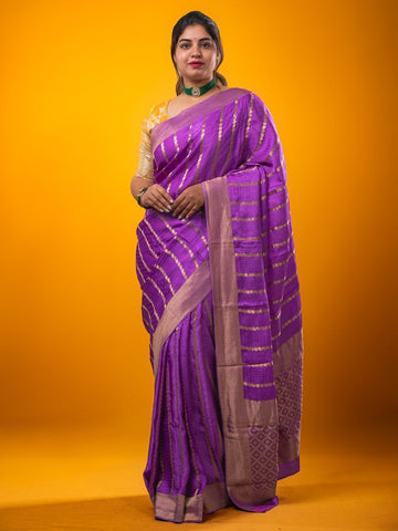 Crape fancy saree dark lavender color allover zari weaves & zari border with zari pallu and plain blouse