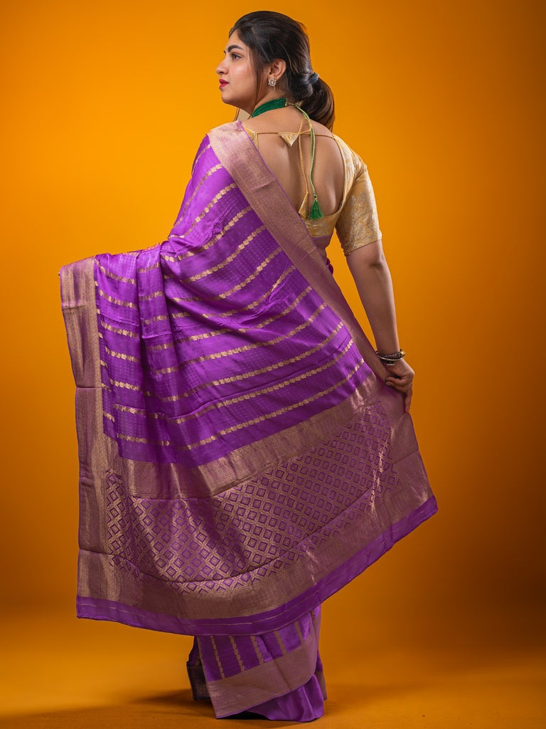Crape fancy saree dark lavender color allover zari weaves & zari border with zari pallu and plain blouse
