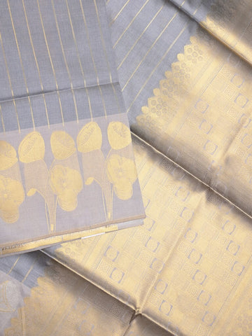 Raw mango fancy saree peacock blue color allover zari weaves & zari border with zari border and attached blouse Copy