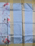Jute fancy saree sea blue color allover prints & kaddi border with contrast pallu and printed blouse