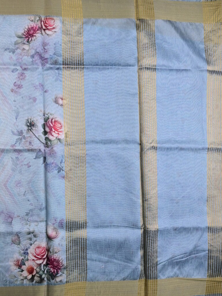 Jute fancy saree sea blue color allover prints & kaddi border with contrast pallu and printed blouse