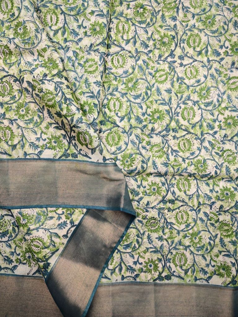 Chanderi cotton saree light green color allover prints & zari border with zari pallu and contrast printed blouse