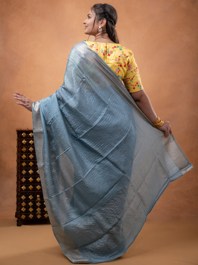 Organza fancy saree light blue color allover weaves & zari border with short pallu and plain contrast blouse