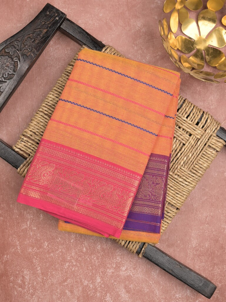Kanchi cotton saree light orange color with allover stripes and contrast zari border with zari pallu