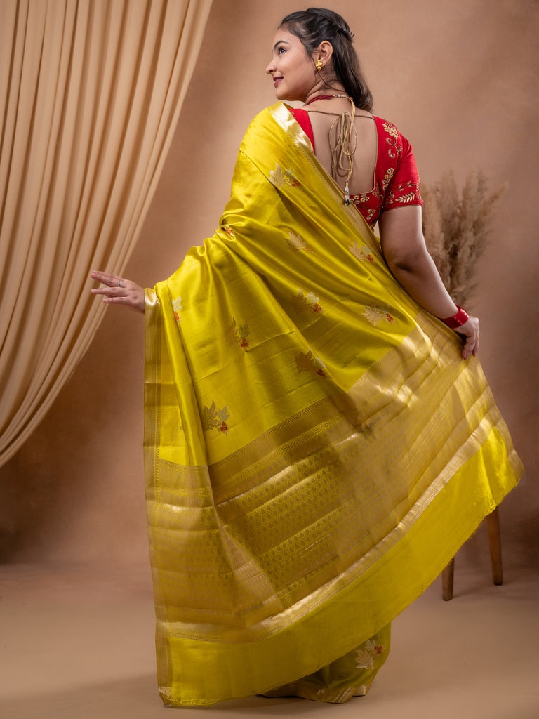 Raw mango pattu saree lemon yellow color allover zari weaves & small zari border with short pallu and contrast blouse