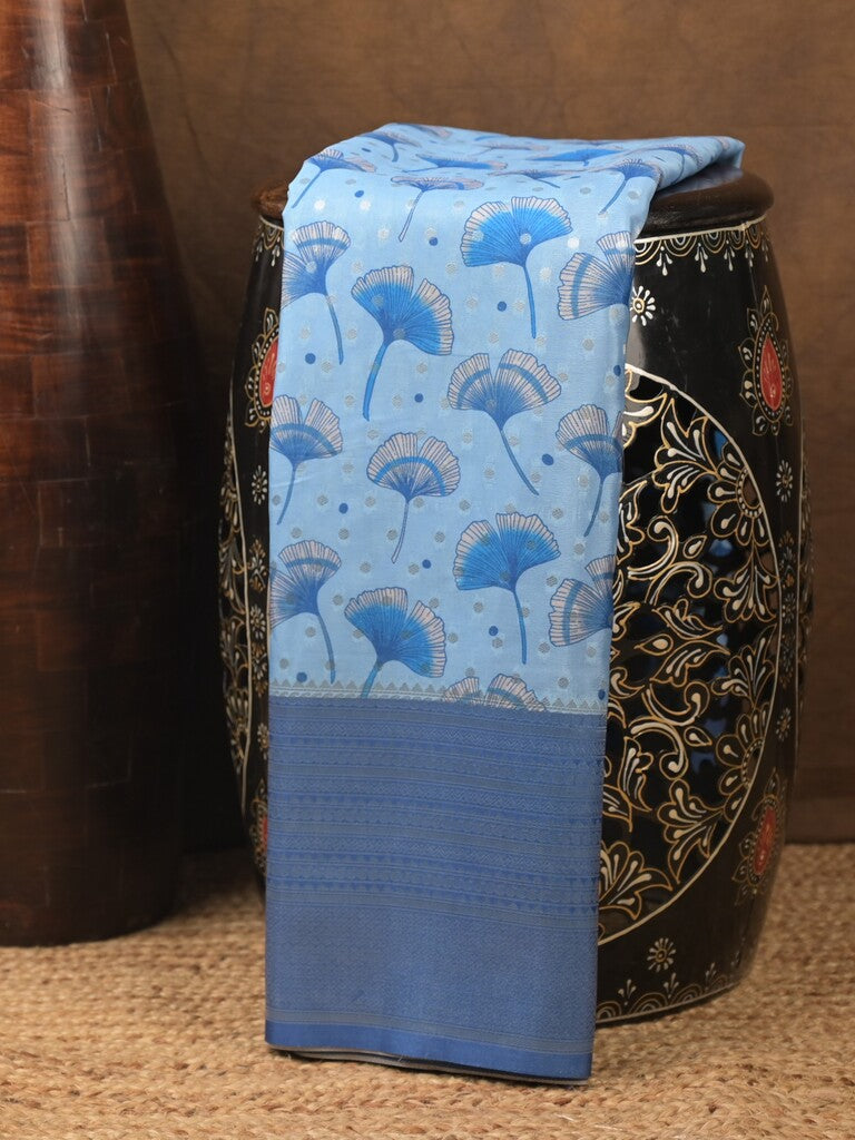 Crape fancy saree light blue color allover prints, zari motifs & zari border with rich pallu and attached blouse