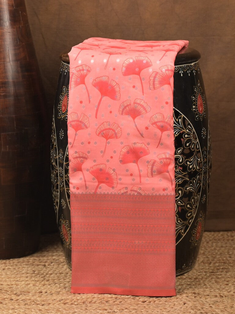 Crape fancy saree coral pink color allover prints, zari motifs & zari border with rich pallu and attached blouse