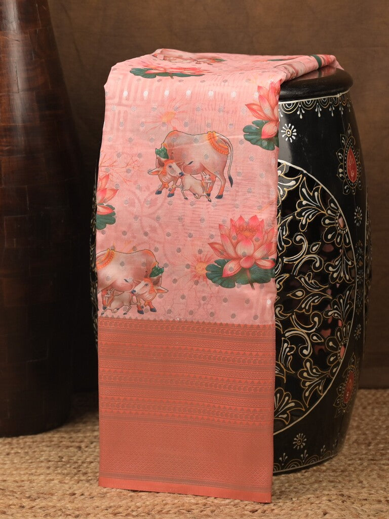 Crape fancy saree light peach color allover prints, zari motifs & zari border with rich pallu and attached blouse